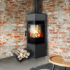 red brick wall with stove in corner